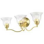 Livex Lighting - Moreland 3 Light Polished Brass Vanity Sconce With Clear Glass - Bring a refined lighting style to your bath area with this Moreland collection three light vanity sconce. Shown in a polished brass finish and clear glass.
