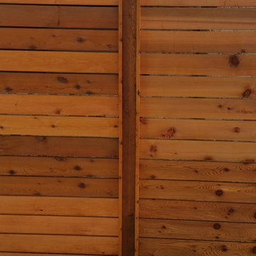 Custom Horizontal cedar fence with automatic swing gate