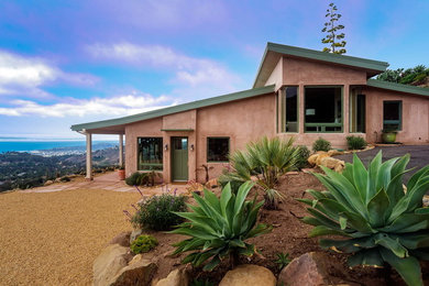 Example of a trendy home design design in Santa Barbara