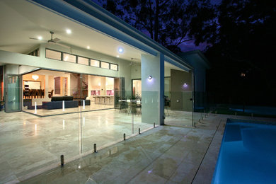Design ideas for a contemporary patio in Brisbane.