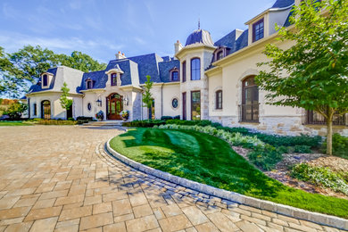 Example of a french country home design design in New York