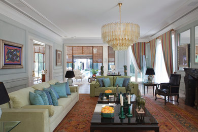 Inspiration for a huge transitional formal dark wood floor and brown floor living room remodel in Miami with blue walls, a standard fireplace and a tile fireplace