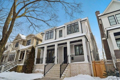 Example of a trendy exterior home design in Chicago with a metal roof