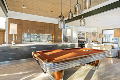 Large minimalist single-wall light wood floor, brown floor and wood ceiling eat-in kitchen photo in Denver with a single-bowl sink, dark wood cabinets, quartz countertops, metallic backsplash, glass tile backsplash, paneled appliances, an island and white countertops
