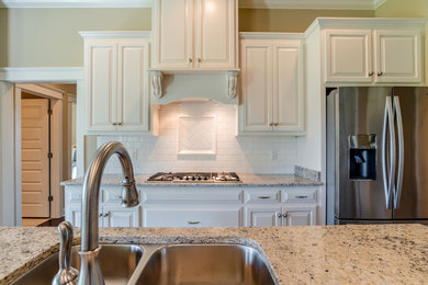 Example of a transitional kitchen design in Miami