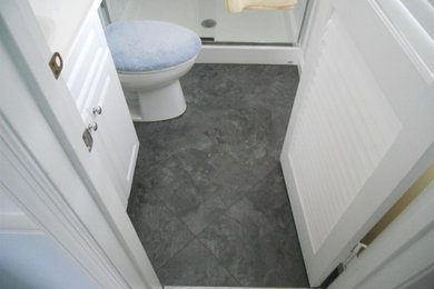 Large size Armstrong Alterna tile makes a small bathroom look great.