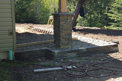 Example of an arts and crafts patio design in Seattle