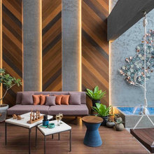 This is How Designers Decorate Double-Height Living Rooms