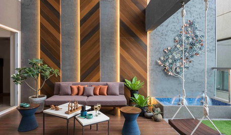 This is How Designers Decorate Double-Height Living Rooms