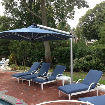 Chaise Lounge Chairs and Umbrella for Pool Area