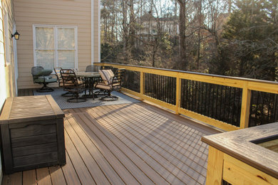 Inspiration for a backyard wood railing deck remodel in Atlanta