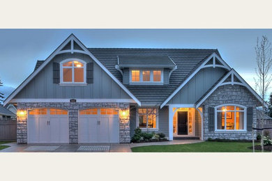 Example of an arts and crafts exterior home design in Vancouver