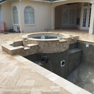 Complete Renovation adding a spa and Sunshelf,kitchen,vein cut Ivory Travertine