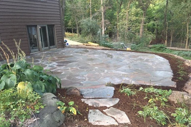 Elegant patio photo in Other