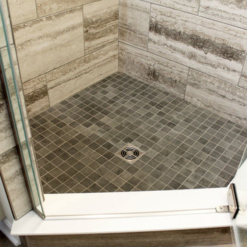 Gray Master Bathroom with Tiled Shower and Barn Door