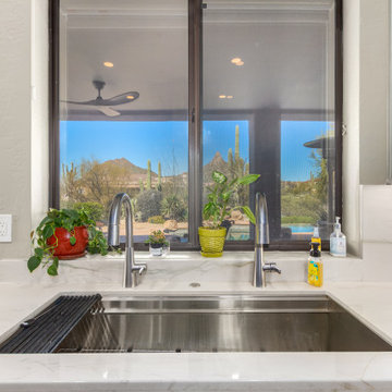 Scottsdale, AZ Kitchen Sink with Desert Mountain Views and Quartz Countertops