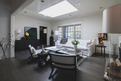 Transitional family room photo in Calgary