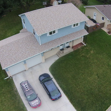 New Owens Corning "Amber" color asphalt shingle roof.