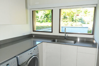 Laundry room photo in Vancouver