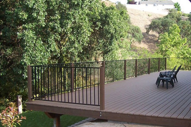 Inspiration for a large timeless backyard deck remodel in Indianapolis