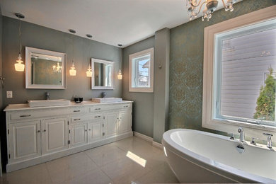 Inspiration for a transitional white tile and porcelain tile porcelain tile and beige floor bathroom remodel in Montreal with raised-panel cabinets, white cabinets and a vessel sink