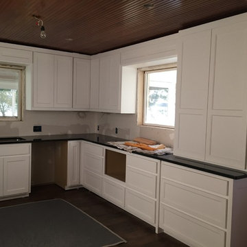 Clever idea to put an upper cabinet on 3 drawer base to create a pantry