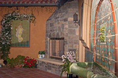 Example of a tuscan patio design in Los Angeles
