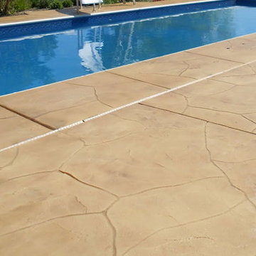 Decorative Hand-Cut Overlay on Spacious Pool Deck