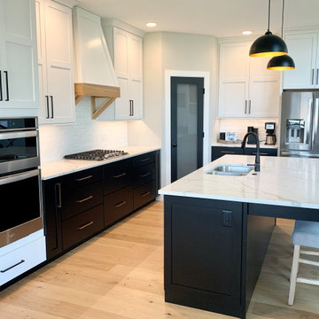 Kitchen with Black Bases and White Uppers in Iowa Quad Cities