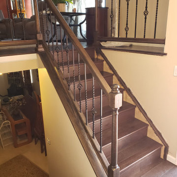 Classic Iron Balusters & Dark Wood Staircase Transformation