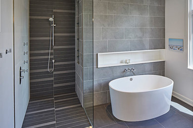 Inspiration for a mid-sized contemporary master gray tile bathroom remodel in Toronto