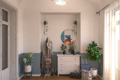 Example of a small country guest laminate floor, brown floor and vaulted ceiling bedroom design in Other with beige walls and no fireplace