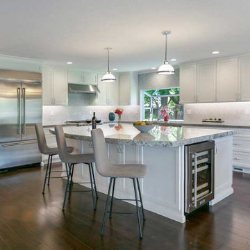 Large Kitchen Island Topped with Polished Nevaska Granite