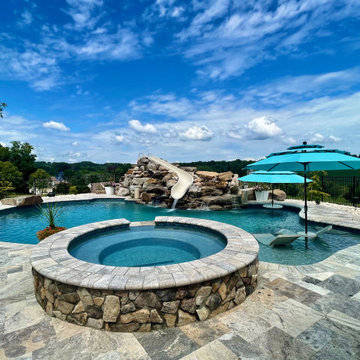 Plaster Pool Project with Waterslide and Spa.