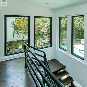 New Black Windows in Modern Stairway - Renewal by Andersen Georgia