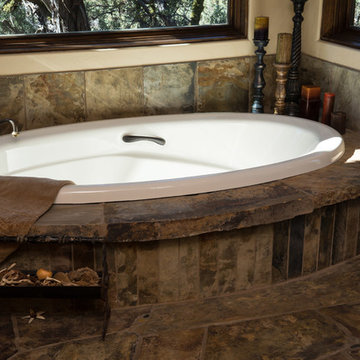 Water tower inspired home master bath suite soaking tub