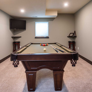 Modern Windowless Lower Level Media and Family Room Featuring "Faux Windows"
