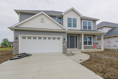 Example of a transitional exterior home design in Other