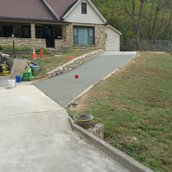 Concrete driveway with stone wall, we also done the stone porch about 35 years e - Products