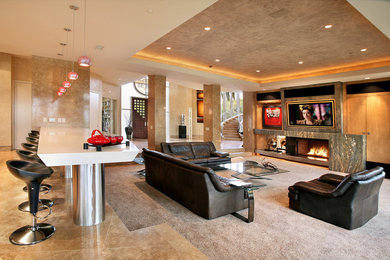 Example of a minimalist family room design in Orange County with a stone fireplace