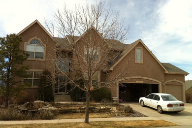 Example of a classic exterior home design in Denver
