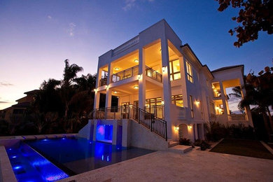 Home design - large mediterranean home design idea in Miami