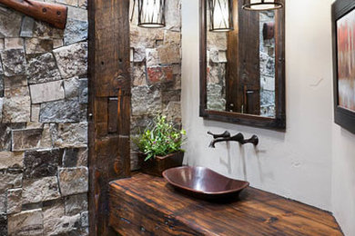 Mountain style bathroom photo in Other