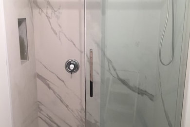 Minimalist master black and white tile and porcelain tile porcelain tile and white floor bathroom photo in Vancouver