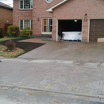 New front veranda, garden bed, walkway, re-lay driveway