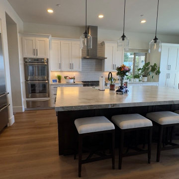Transitional Two-Tone Kitchen with Expansive Island