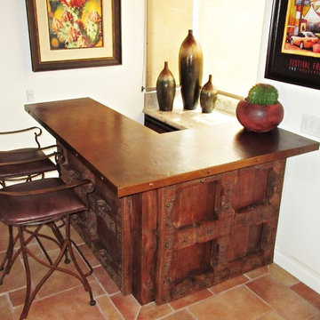 Architectural Mahogany Panels on Bar with Hammered Copper Countertop