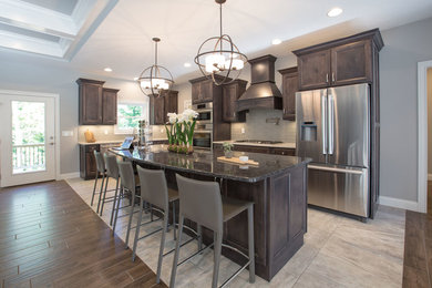 Kitchen photo in Other with an island