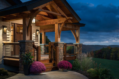 Large rustic gray two-story mixed siding gable roof idea in New York