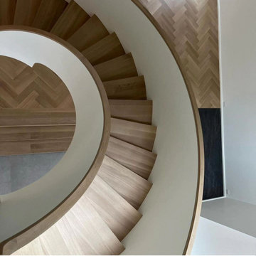 Custom Curved Stairs with Knee Wall